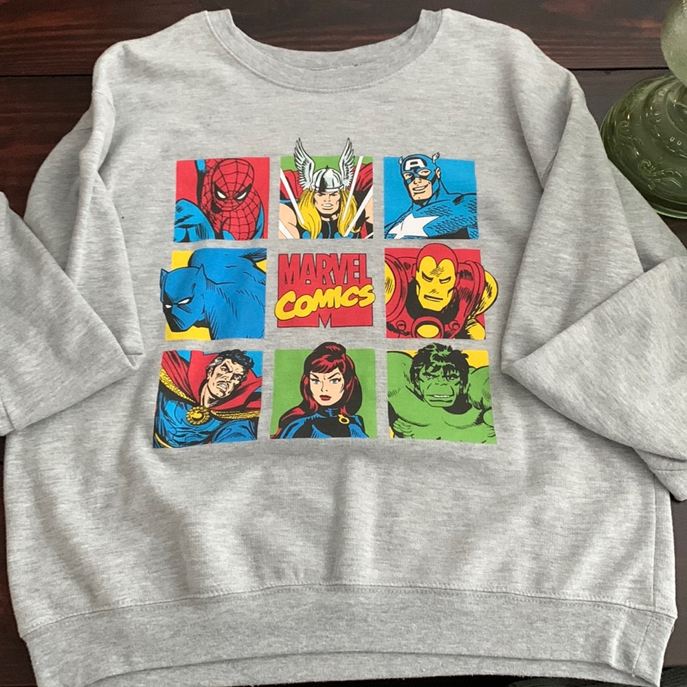from walmart, color is grey, very warm and soft, marvel characters on front